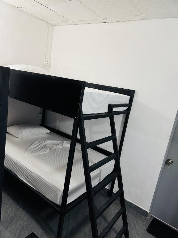 Postel nebo postele na pokoji v ubytování Hello Aliya Hostel