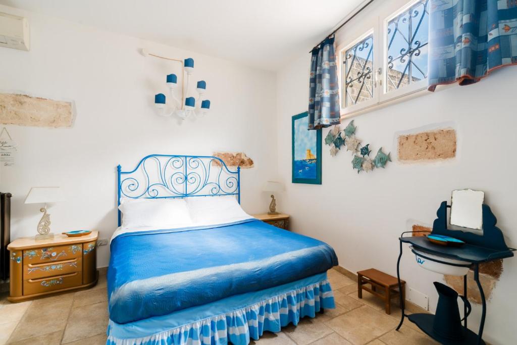 Postel nebo postele na pokoji v ubytování Letto & Merenda - Salento Selection