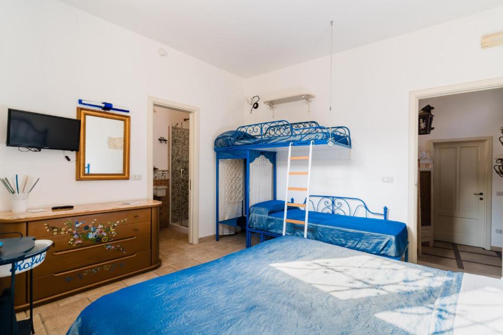 Postel nebo postele na pokoji v ubytování Letto & Merenda - Salento Selection