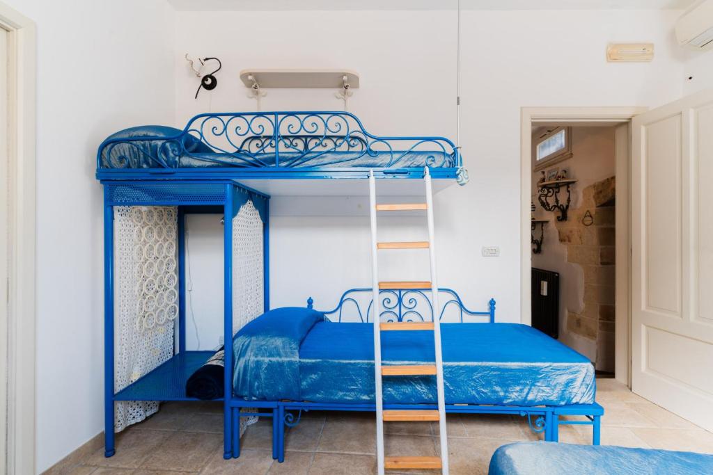 Palanda nebo palandy na pokoji v ubytování Letto & Merenda - Salento Selection