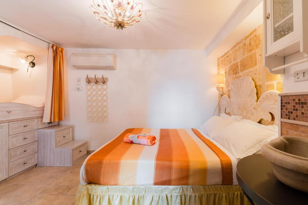 Postel nebo postele na pokoji v ubytování Letto & Merenda - Salento Selection