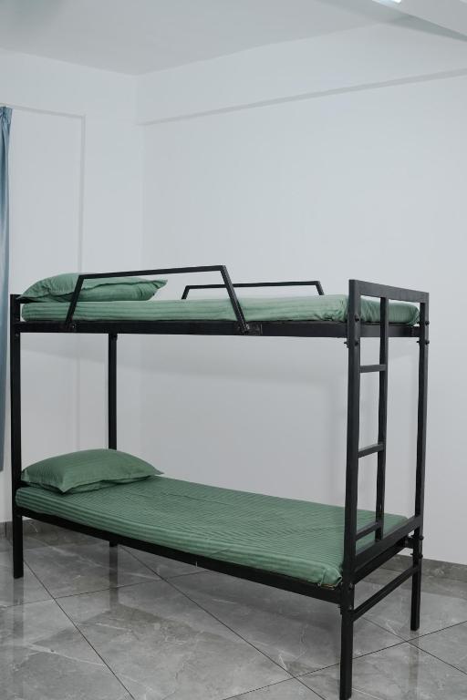 Postel nebo postele na pokoji v ubytování Hotel Aamis Villa