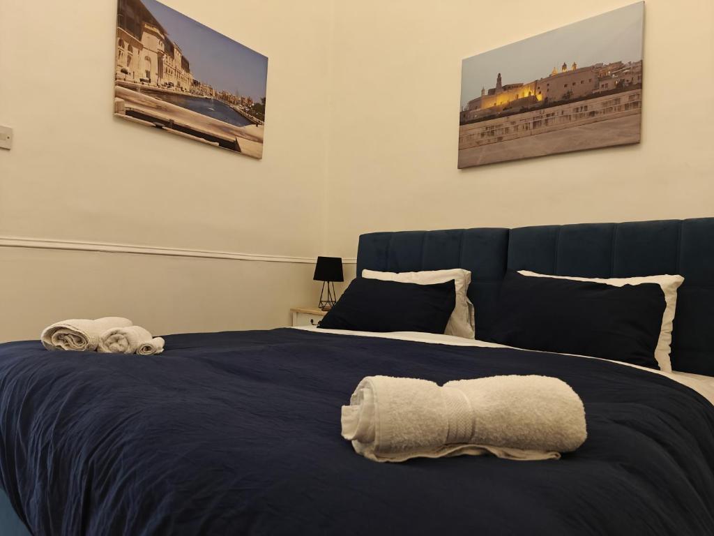 Postel nebo postele na pokoji v ubytování 3 Cities Heart 2