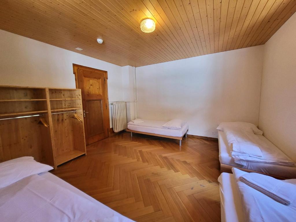 Postel nebo postele na pokoji v ubytování Nordic Arena House