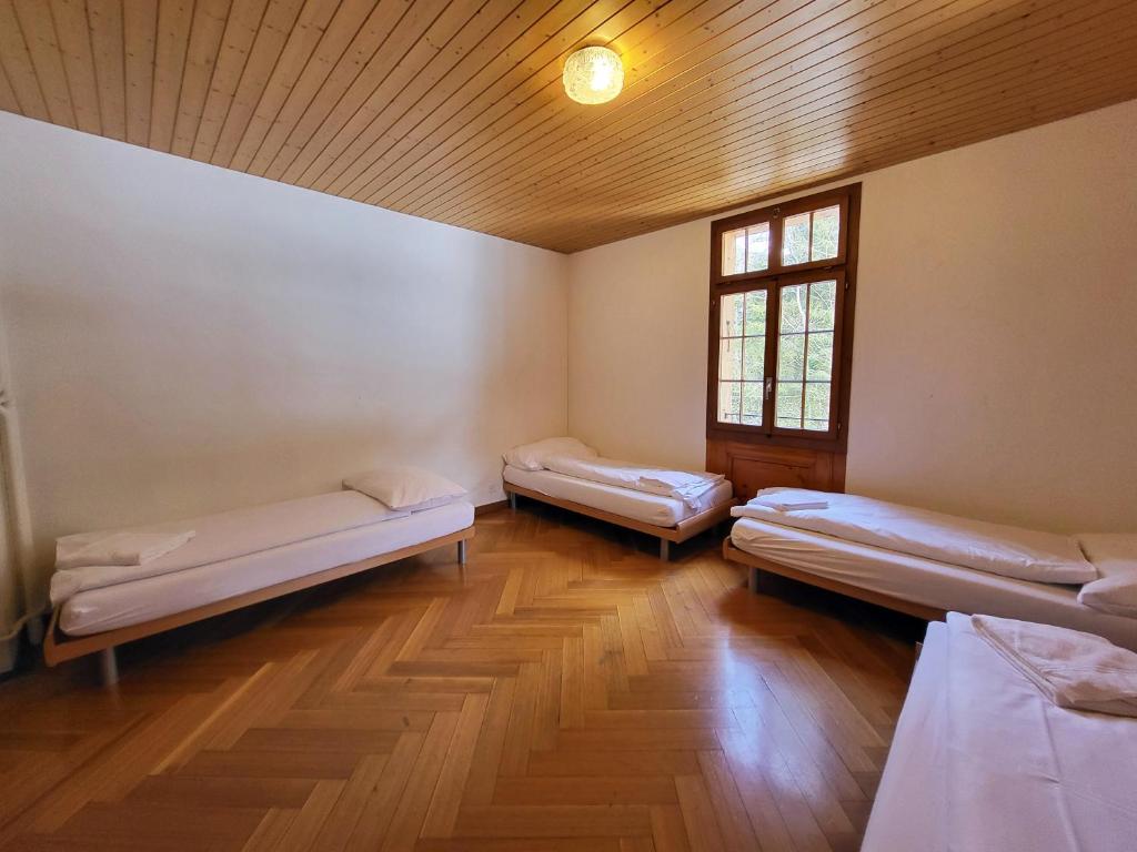 Postel nebo postele na pokoji v ubytování Nordic Arena House