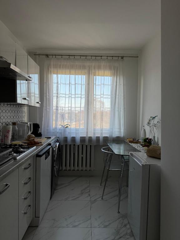 Kuchyňa alebo kuchynka v ubytovaní Apartament -Jak w domu- Czeladź 60m2 Centrum Katowic 10km