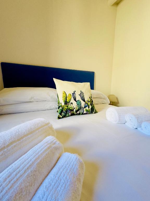 Postel nebo postele na pokoji v ubytování Amoredimare Casa Vacanze