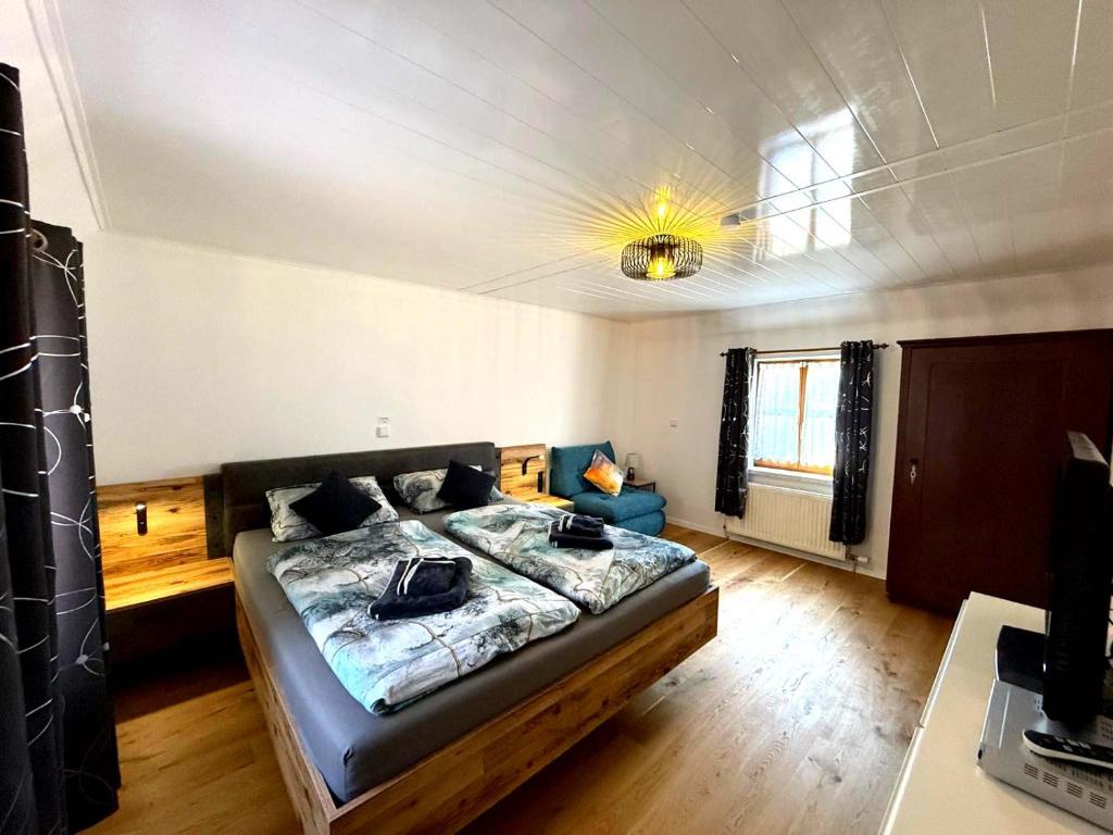 Postel nebo postele na pokoji v ubytování Ferienhaus TraunseeStrand