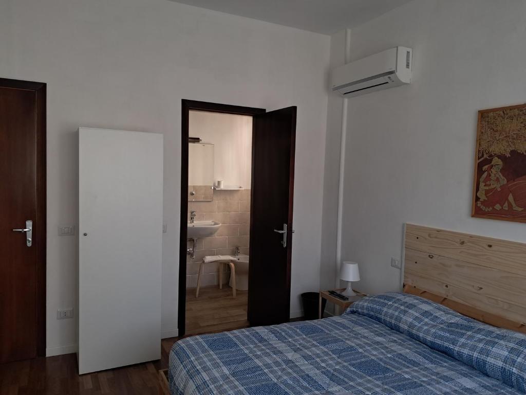 Postel nebo postele na pokoji v ubytování B&B Il canale