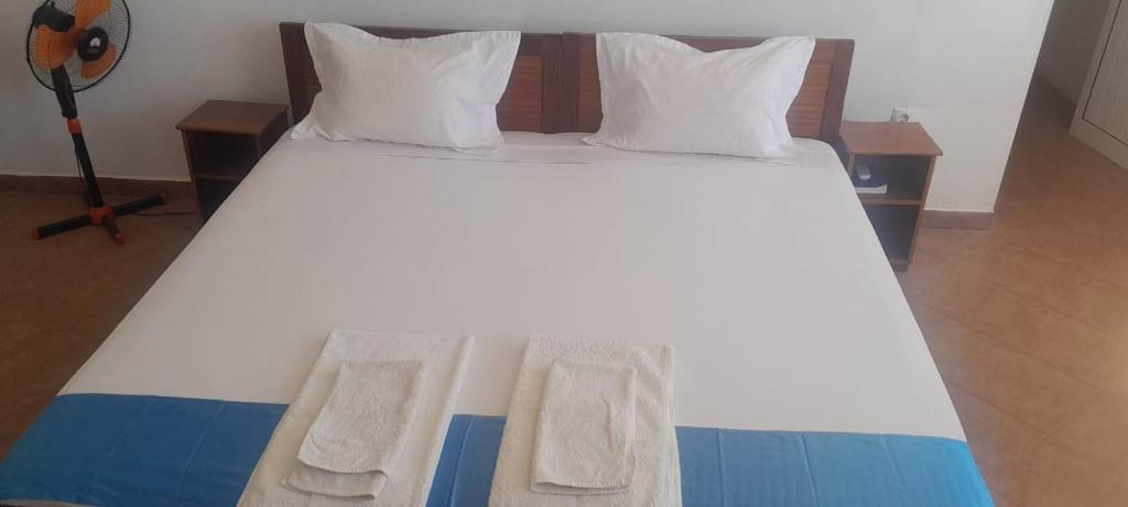Postel nebo postele na pokoji v ubytování Cacimba Sunset Lodge