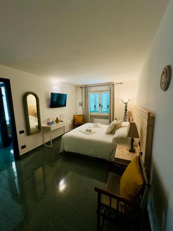 Łóżko lub łóżka w pokoju w obiekcie Amoredimare B&B in Villa