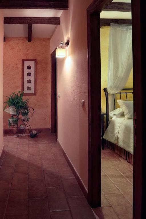 Posteľ alebo postele v izbe v ubytovaní Patio de las Flores