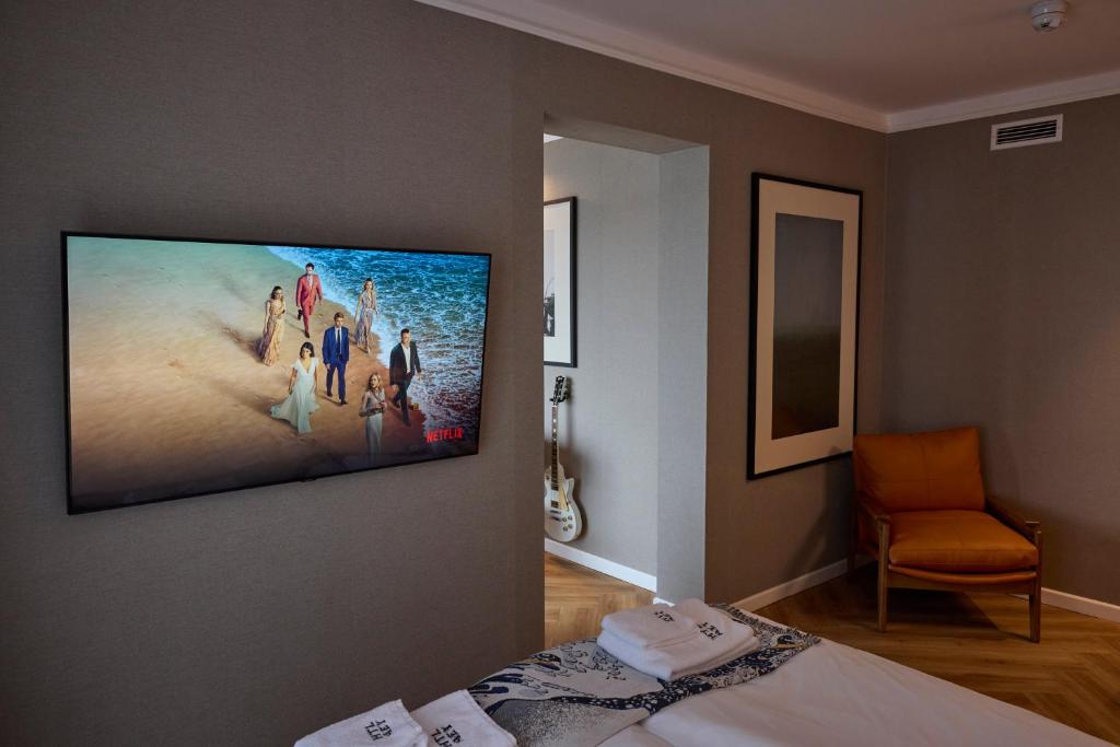 TV a/nebo společenská místnost v ubytování Hotel Akureyri