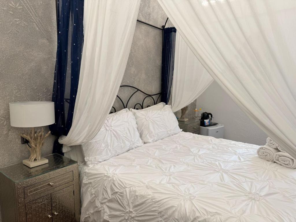 Postel nebo postele na pokoji v ubytování B&B i MORI