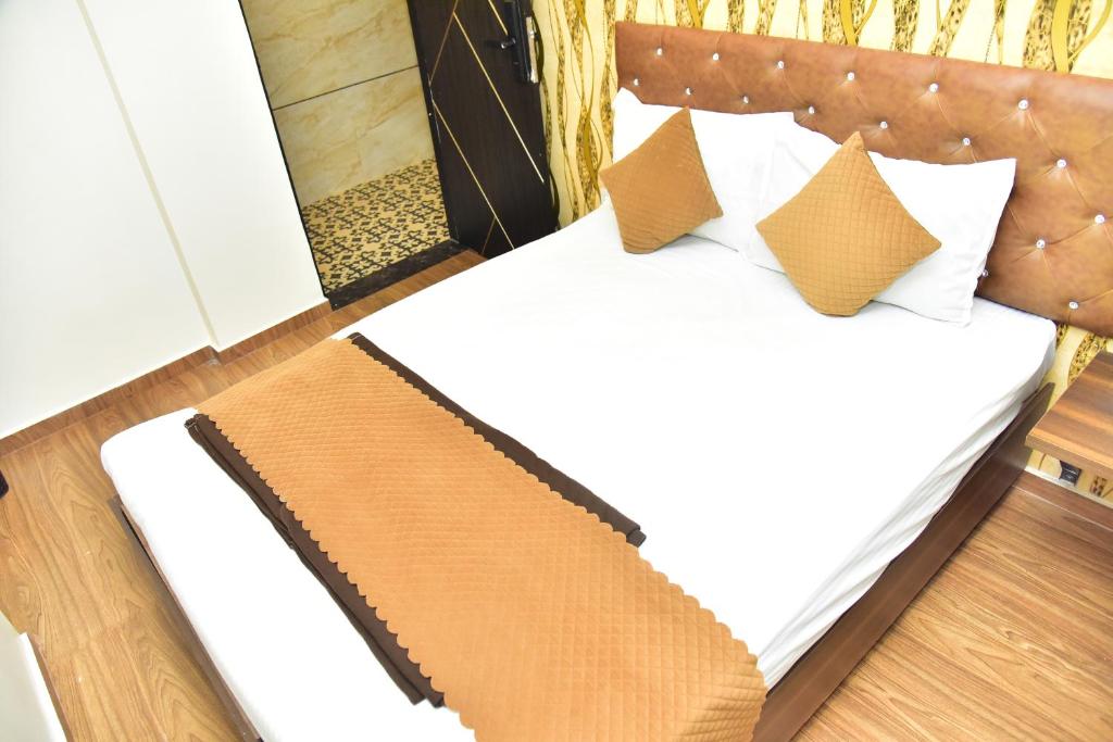 Postel nebo postele na pokoji v ubytování Meadows Inn