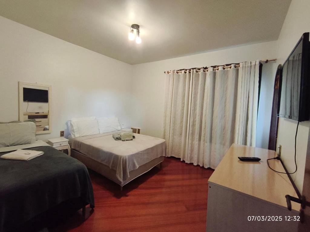 TV a/nebo společenská místnost v ubytování Suite FIRST CLASS - tripla