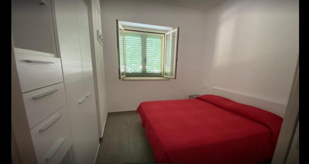 Postel nebo postele na pokoji v ubytování L'Orto di MiLa