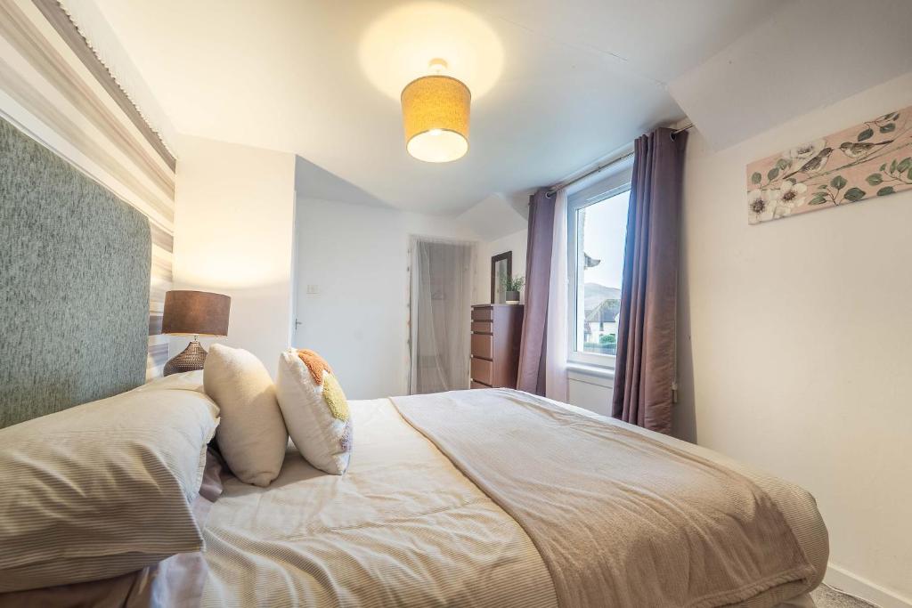 Postel nebo postele na pokoji v ubytování Kilmallie House