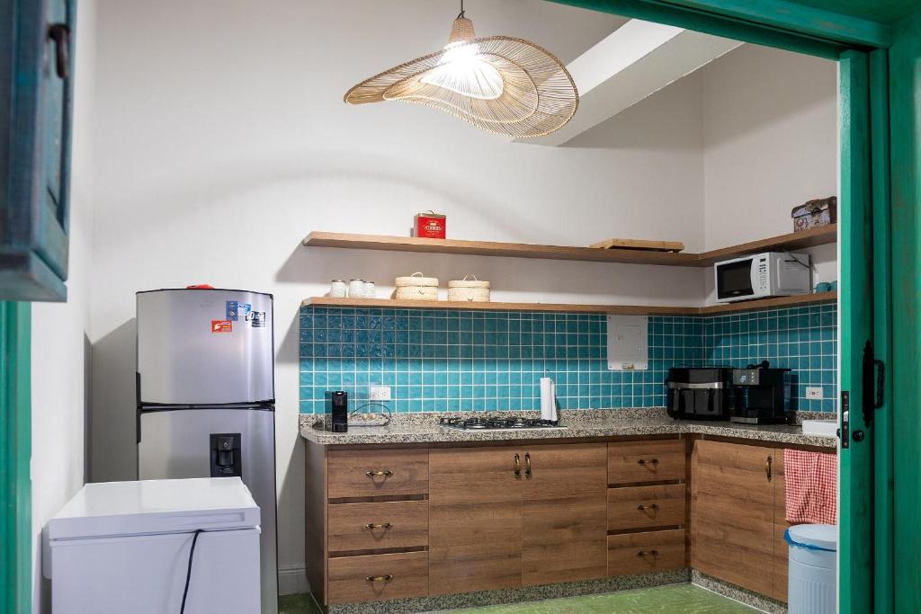 Kuchyň nebo kuchyňský kout v ubytování La Casa de Isa