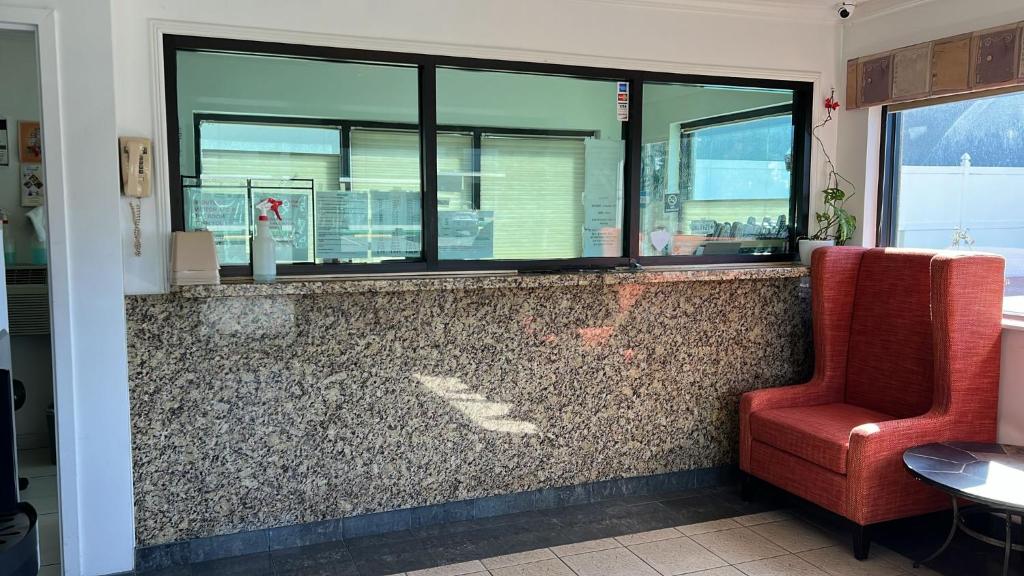 Posezení v ubytování Winslow Motel