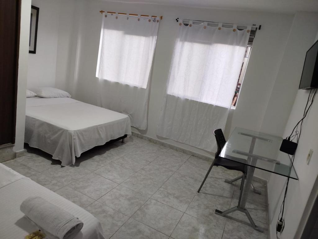 Postel nebo postele na pokoji v ubytování Hotel Bayadera Real