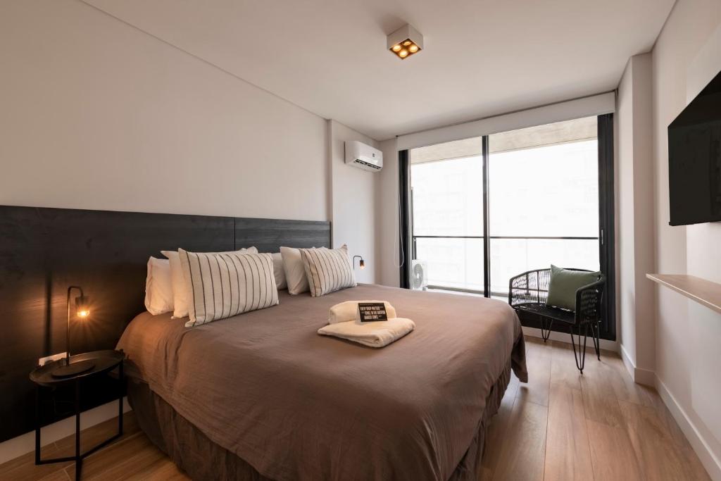 Postel nebo postele na pokoji v ubytování Top Rentals Palermo Soho