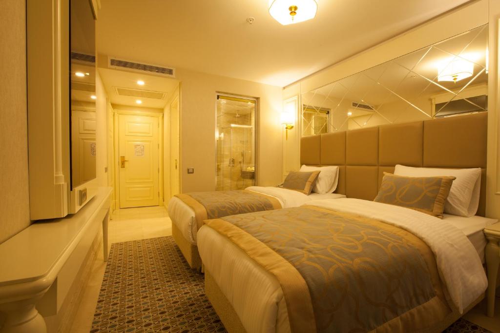 Postel nebo postele na pokoji v ubytování Beethoven Hotel - Special Category