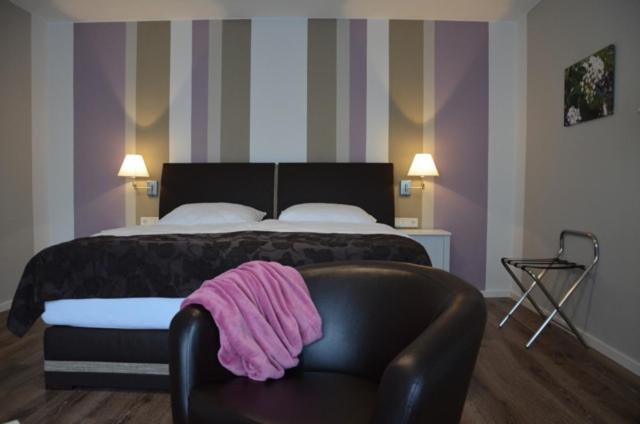 Postel nebo postele na pokoji v ubytování Gästehaus Praliné