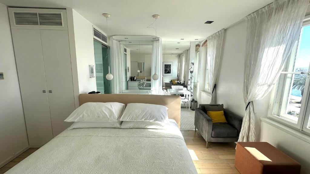 Letto o letti in una camera di Riva Luxury Suites