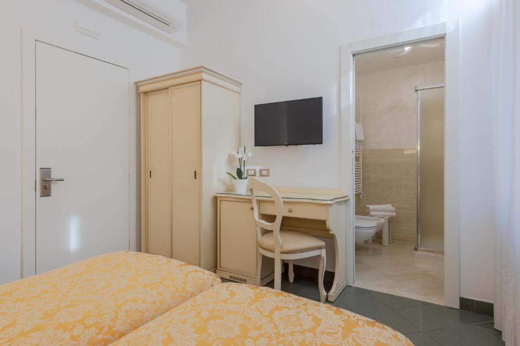 Posteľ alebo postele v izbe v ubytovaní Hotel Marte