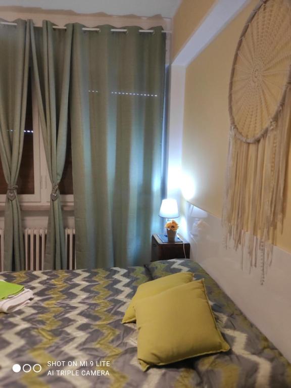 Postel nebo postele na pokoji v ubytování Casa di Ana