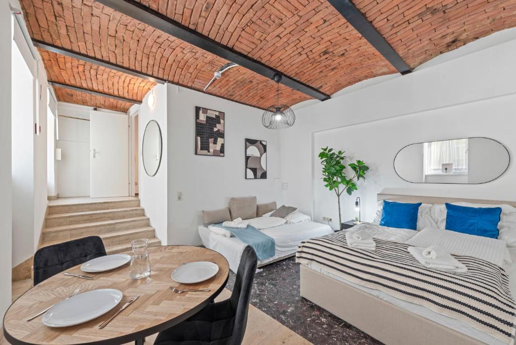 Postel nebo postele na pokoji v ubytování K22 Smart Rooms