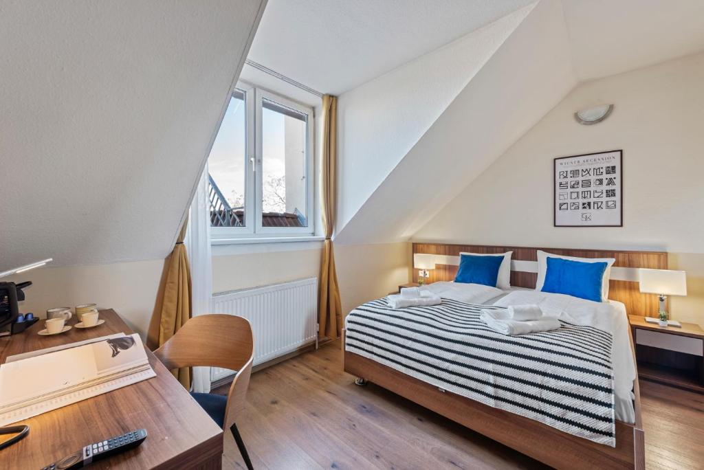 Postel nebo postele na pokoji v ubytování K22 Smart Rooms