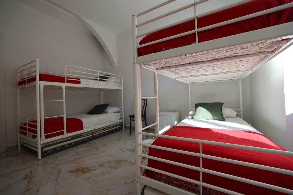 Postel nebo postele na pokoji v ubytování Hostel Bosmi Bed&Language Liguria