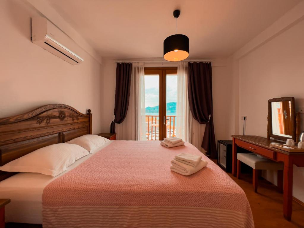 Postel nebo postele na pokoji v ubytování Alice Tatil Evi