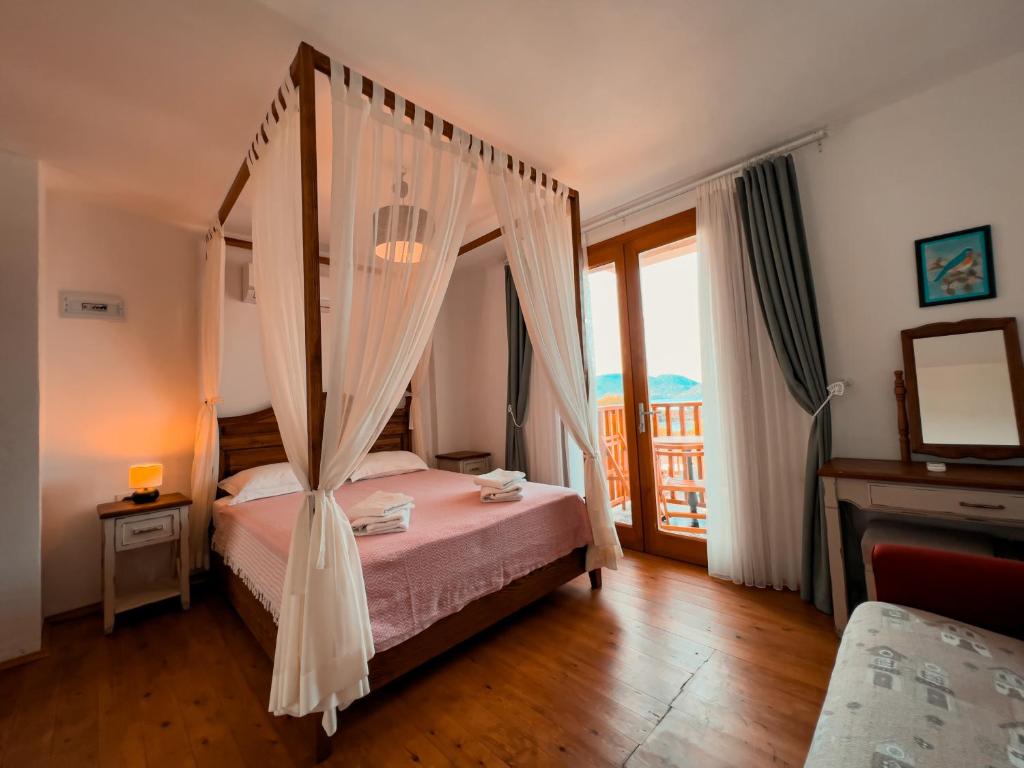 Postel nebo postele na pokoji v ubytování Alice Tatil Evi