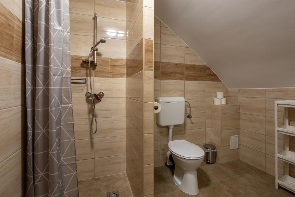 Koupelna v ubytování RP Apartmanház