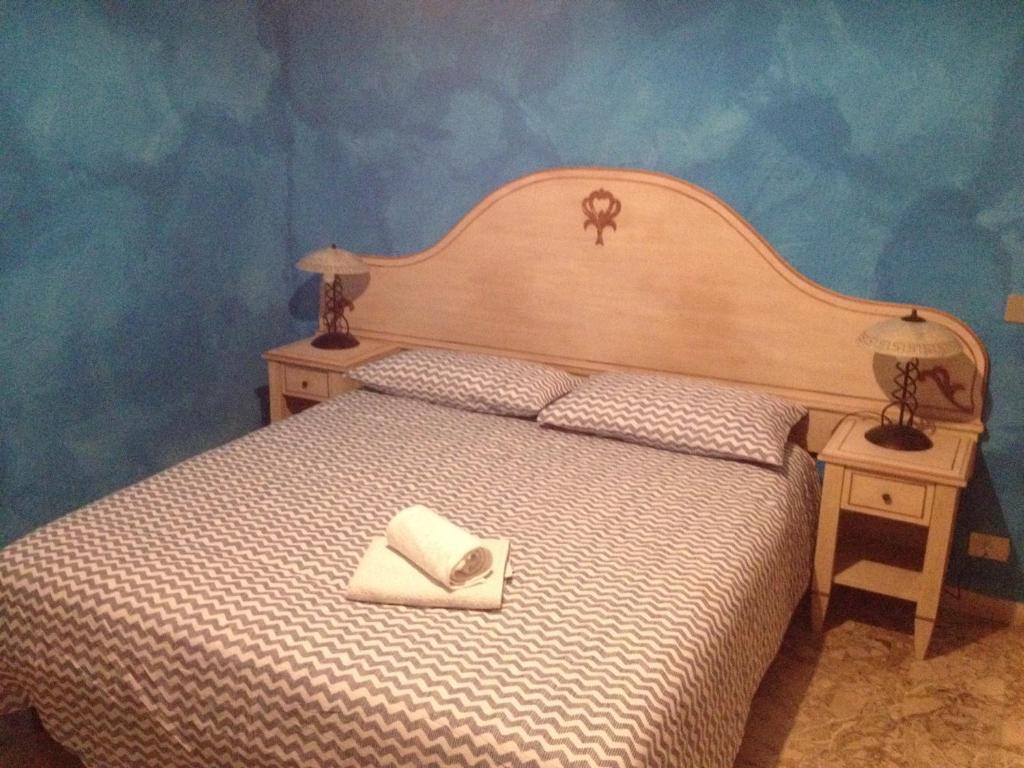 Posteľ alebo postele v izbe v ubytovaní Scala Apartment