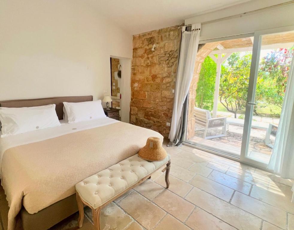 Postel nebo postele na pokoji v ubytování Masseria Vittoria