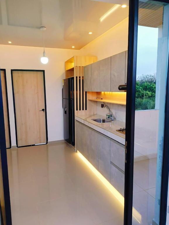 Una cocina o zona de cocina en Sagrado Hotel