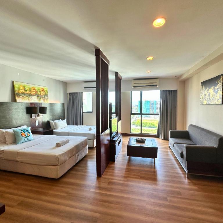Letto o letti in una camera di Ming Greenage Suite 明绿时代套房 @Kota Kinabalu 亚庇市中心