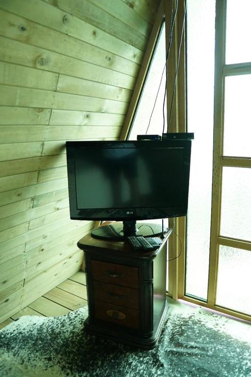 TV a/nebo společenská místnost v ubytování Chalet El Pinal - Copacabana