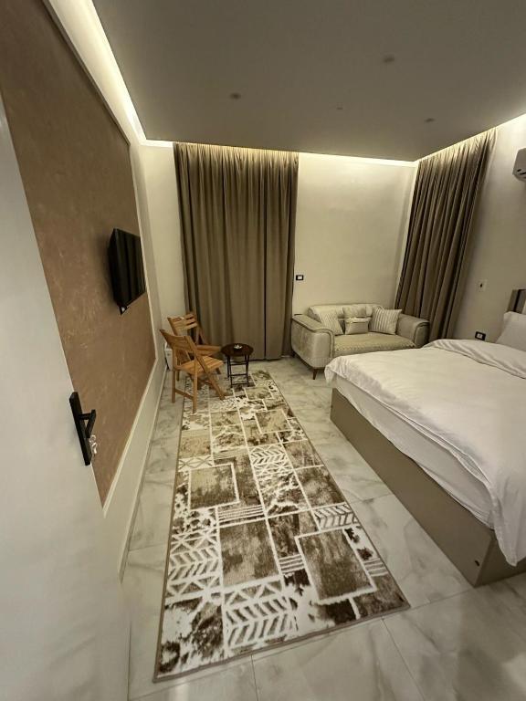 Postel nebo postele na pokoji v ubytování La Casa Del Rey II Downtown Cairo