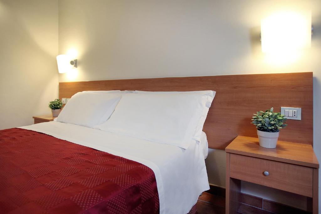 Postel nebo postele na pokoji v ubytování Hotel Sant' Antonio