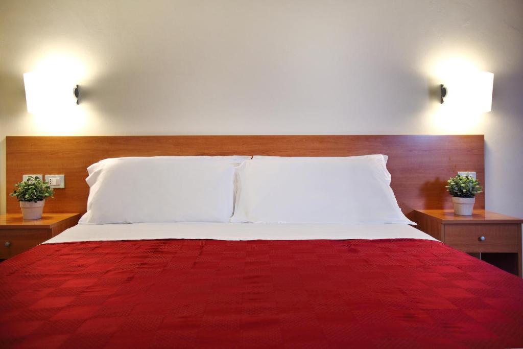 Postel nebo postele na pokoji v ubytování Hotel Sant' Antonio