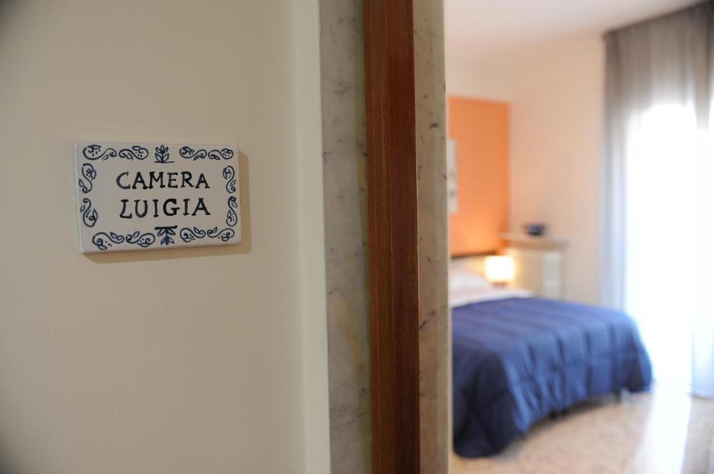 Postel nebo postele na pokoji v ubytování Dimore Le Lucane