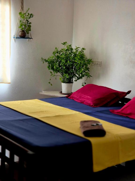 Postel nebo postele na pokoji v ubytování Villa Luna Varkala