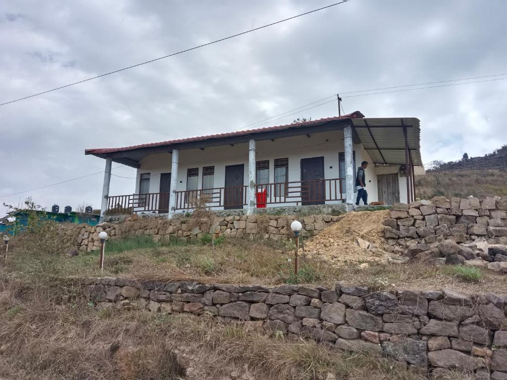 a house on top of a hill at Lawanba Home Stay in Dum-Dum Junction