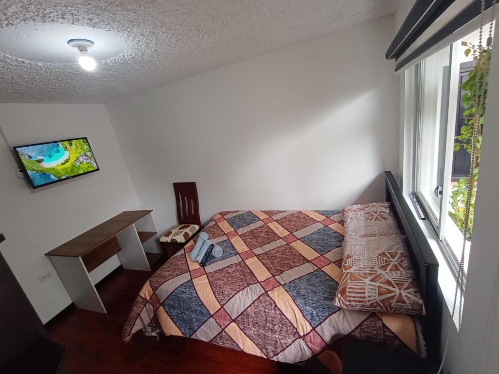 Postel nebo postele na pokoji v ubytování Zidko Guest House