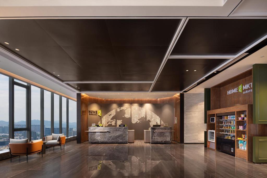 Istumisnurk majutusasutuses Home2 Suite by Hilton Yiwu World Trade Center